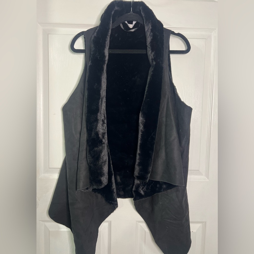 The Reversible Faux Fur Black Vest by Lauren Conrad.